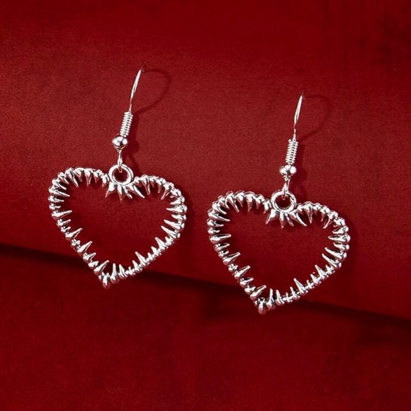 Any 3/$25! Silver Barbed Heart Drop Earrings - Picture 2 of 6